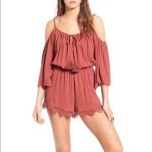 Socialite, orange romper. Size large. Excellent condition